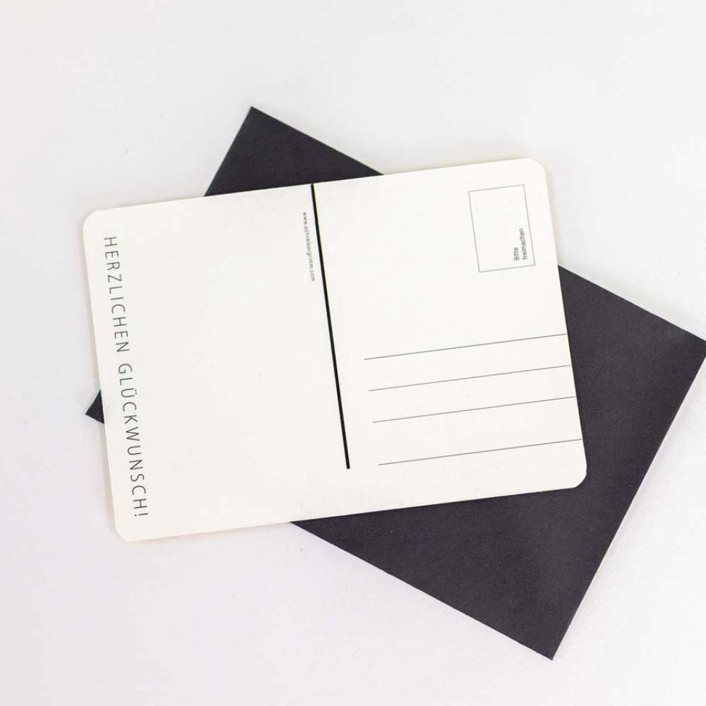 Rückseite der Postkarte mit Herzlichen Glückwunsch Schriftzug