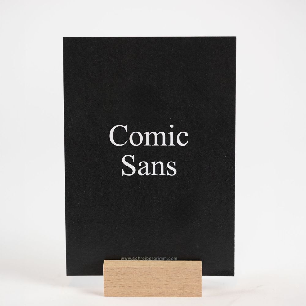 Postkarte im Kartenständer